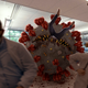 Illustration for article titled Researchers Warn Of New Giant Covid-19 Variant Large Enough To Swallow Grown Man Whole